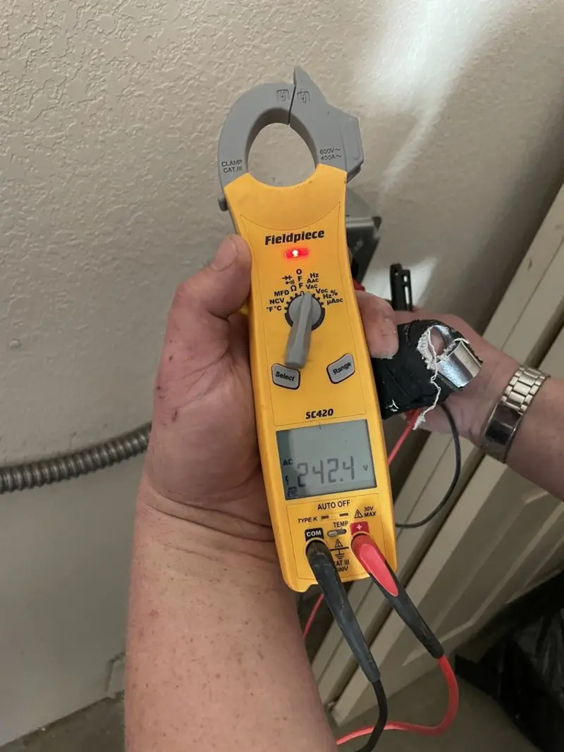 Voltage testing with clamp meter during Circuit Breaker Repair in Knightdale